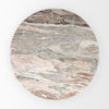 Overhead bird's-eye view of the pink marble tabletop variant showcasing bold, dramatic natural stone patterns