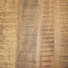 A final macro shot of the wood surface celebrating the unique natural character of this solid wood piece