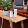 Close-up shot focusing on the high-quality wood joinery and the smooth natural finish of the rectangular tabletop