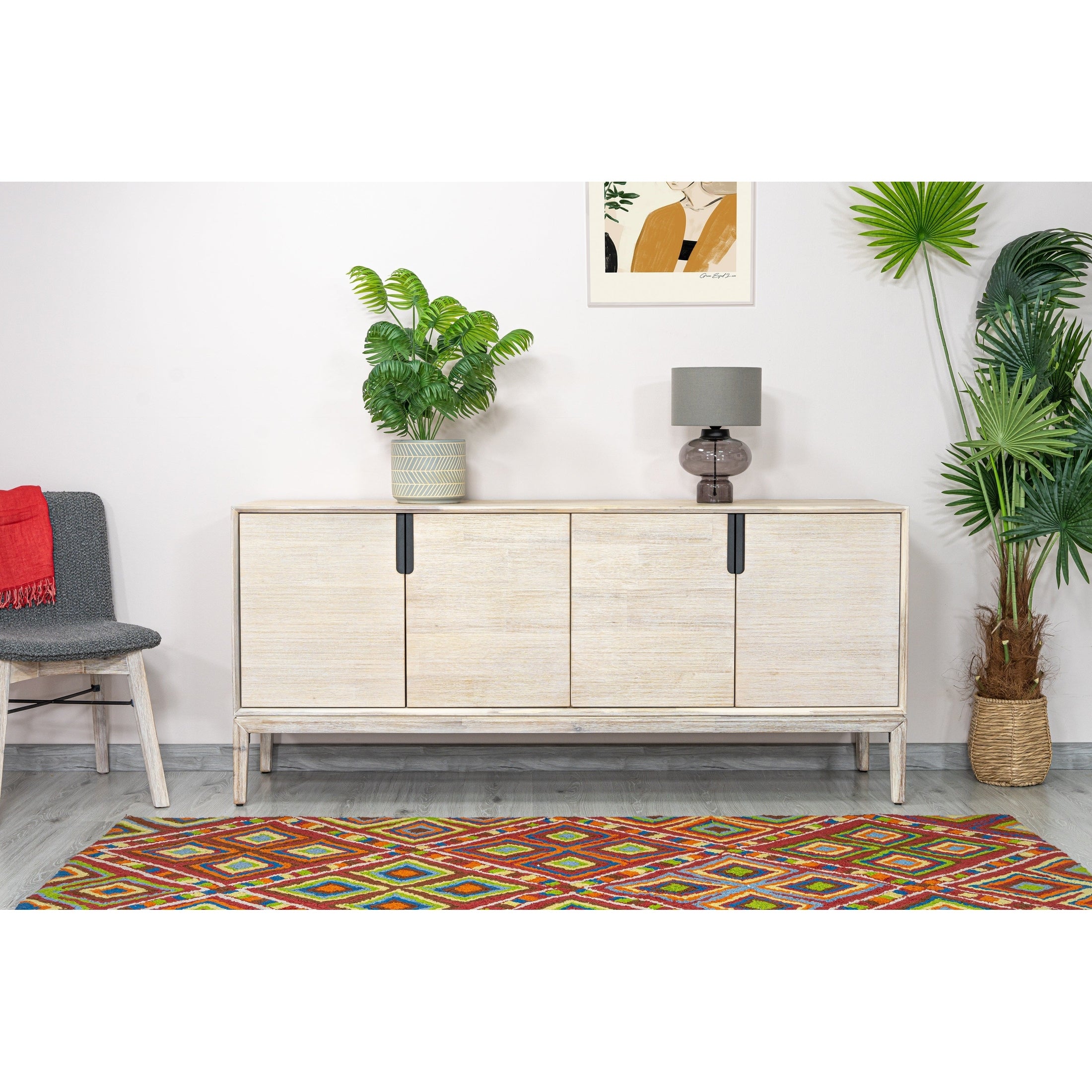 Straight-on front view of the Gemini sideboard featuring a light whitewashed wood finish and four handle-free cabinet doors