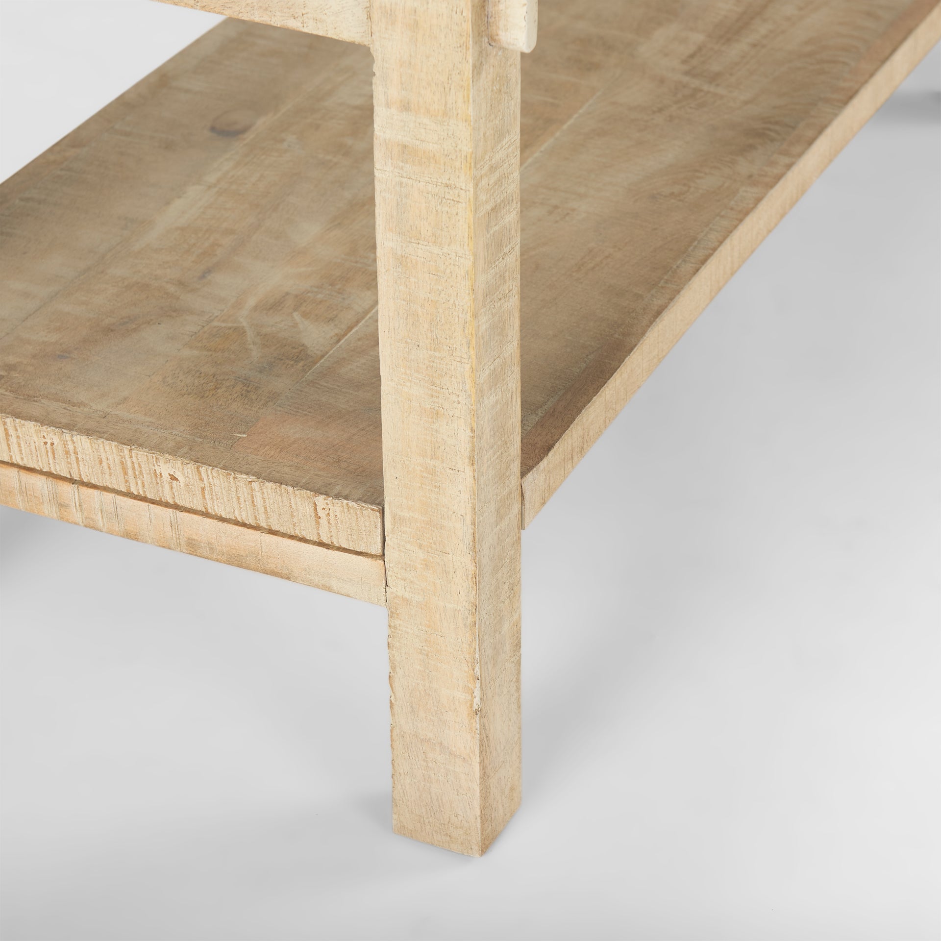Front view of the Rosie console table in a light natural mango wood finish featuring a minimalist double-tier design