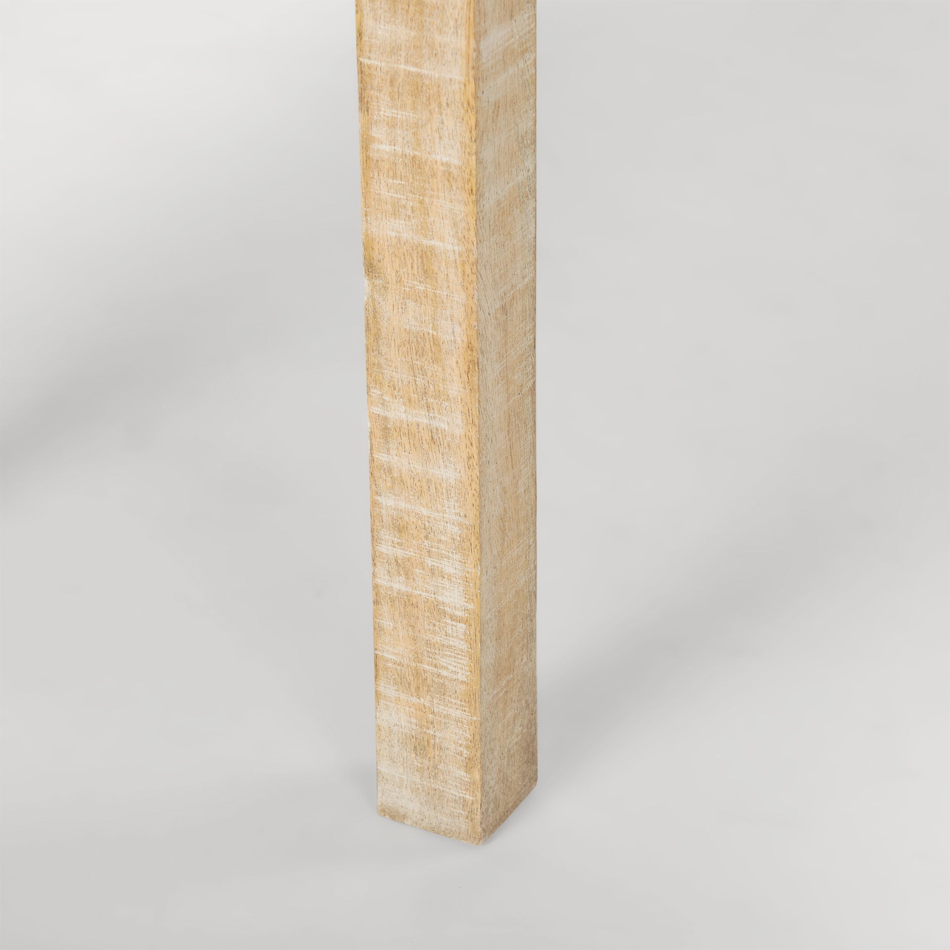 Front view of the Rosie console table in a light natural mango wood finish featuring a minimalist double-tier design