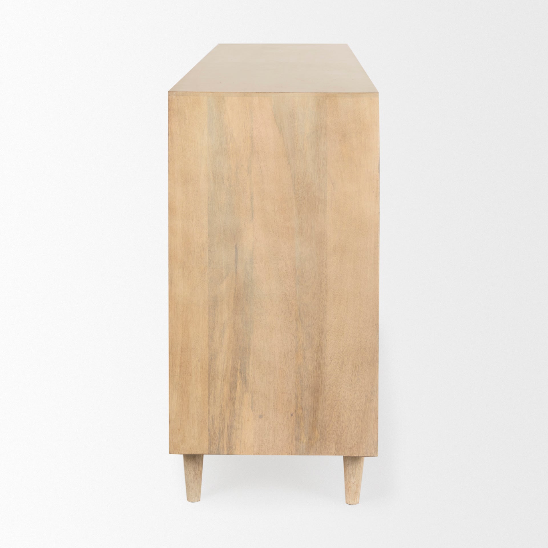 Front view of the Tucker sideboard featuring a natural light wash finish and four doors with elegant recessed arched panel details