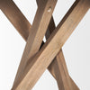 Macro shot of the central interlocking leg detail emphasizing the solid wood construction and organic texture