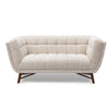 Three-quarter front view of the Stella Loveseat in cream boucle with a walnut-stained wood base