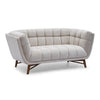 Straight-on front view of the Stella Loveseat showcasing the vertical channel-tufted backrest
