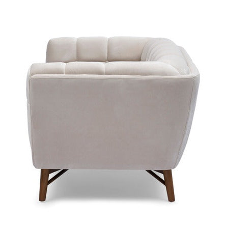 Three-quarter front view of the Stella Loveseat in cream boucle with a walnut-stained wood base