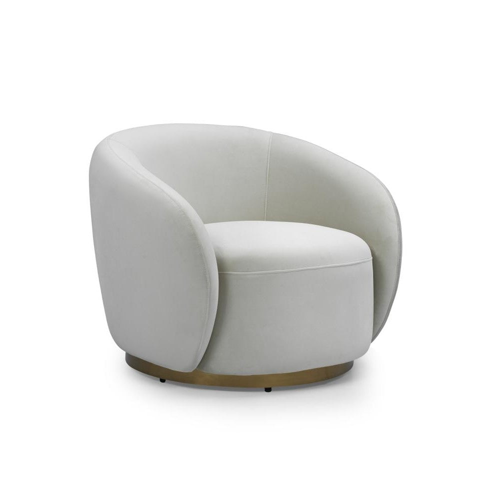 Front view of the Sumi Accent Chair in champagne velvet with a recessed circular gold swivel base