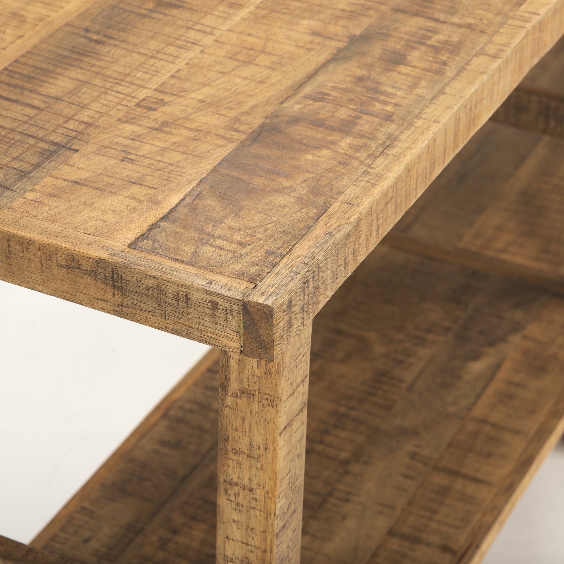 Front view of the Rosie console table in a light natural mango wood finish featuring a minimalist double-tier design