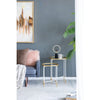 Lifestyle view of Tara round nesting tables in a bright corner