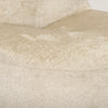 Detailed macro view of the multi-tonal bouclé fibers on the seat of the Beverly chair.
