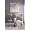 Lifestyle view of Villa marble accent table paired with a grey wingback chair