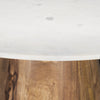 Side-perspective detail shot focusing on the sophisticated contrast between the cool stone top and warm wood base